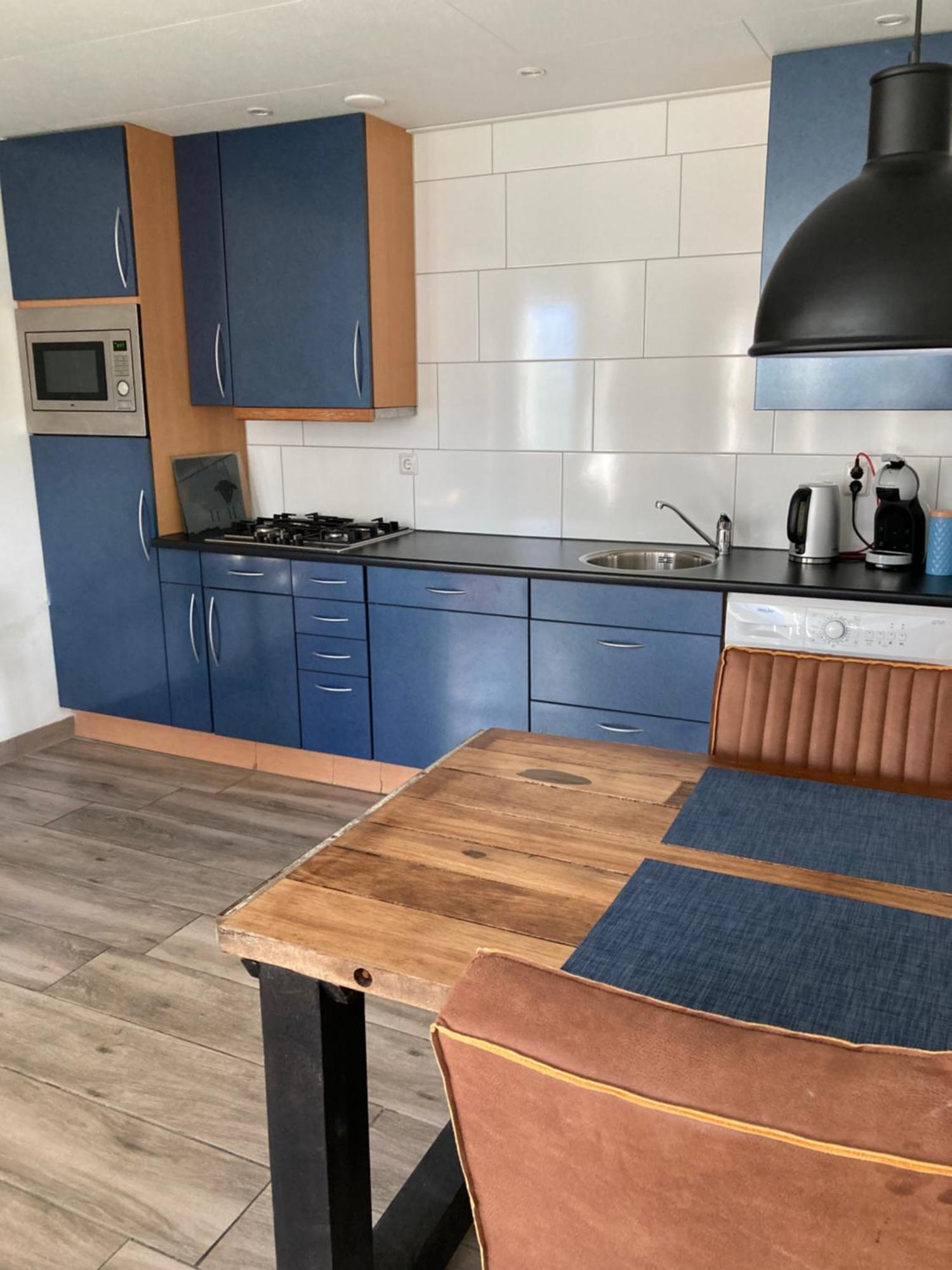 Bungalow Op Bedrijf Met Melkkoeien De Cocksdorp  Esterno foto